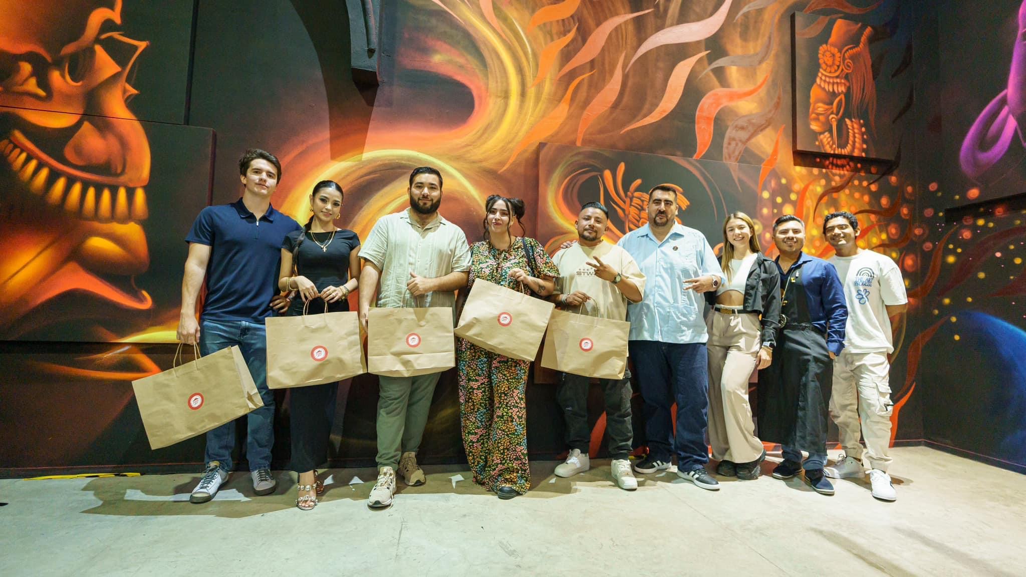 Pizza hut realiza evento de pizza y vinos en galería arte 1010